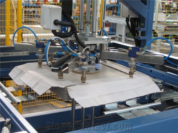 ECOFORCE 3000 - FEEDING AND BOX REMOVING SYSTEM FOR SMOOTHING, LAPPING, GRINDING AND CUTTING LINES FOR INTENSIVE LOADS
