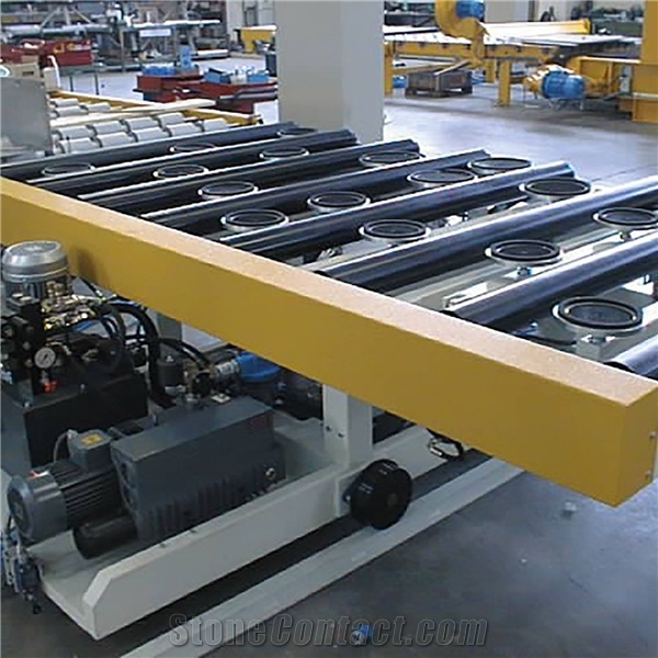 CLVM Automatic loading device for slabs