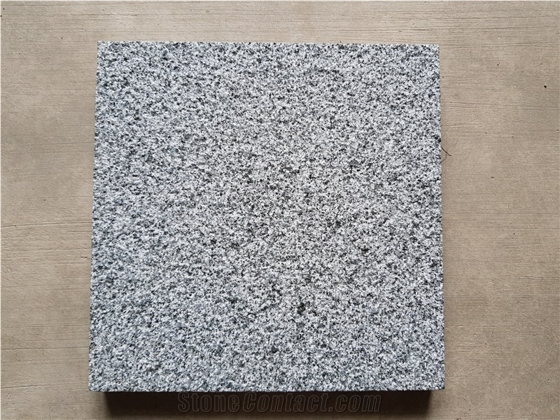 G654 Grey Granite bush-hammed tile
