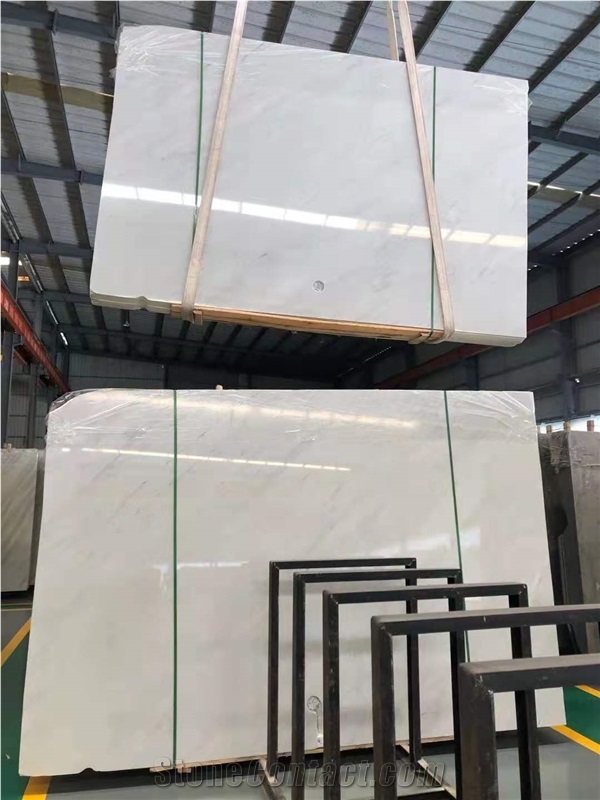 Baoxing White marble tile slabs price 