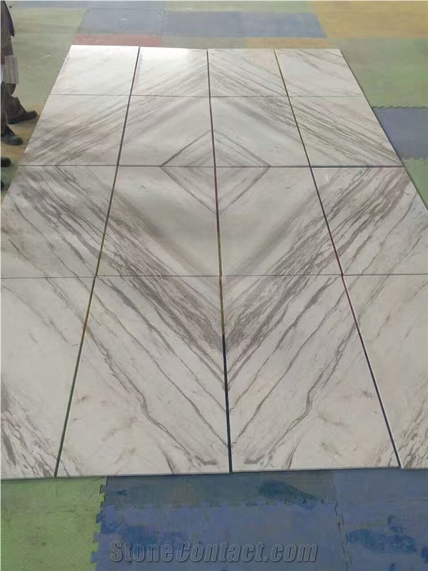 wavy and diagonal thick grey veins white marble 