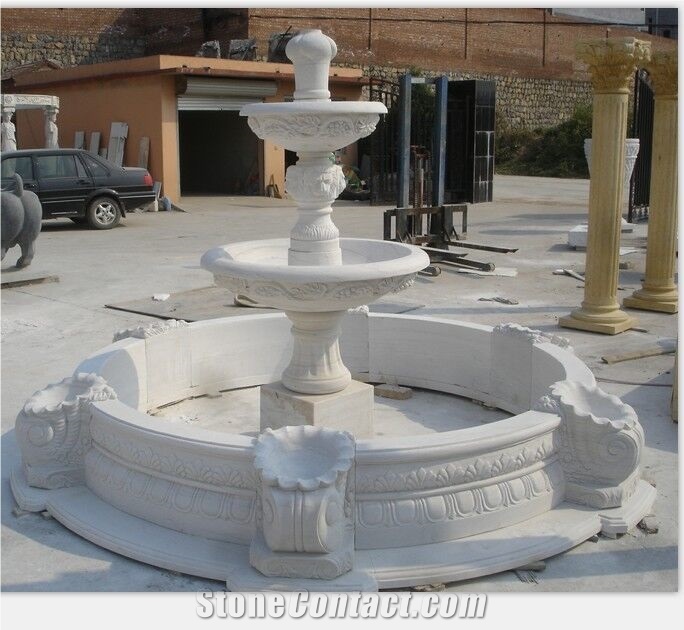 sculptured white marble water featured indoor fountain 