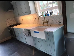 Classic White Carrara Marble with a full backsplash