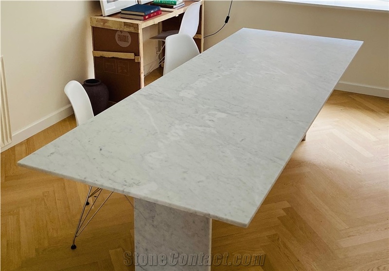 Dining table in Carrara white marble