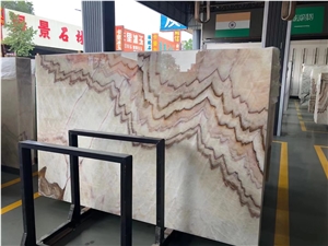 China Rainbow Onyx Landscape Slab In China Stone Market