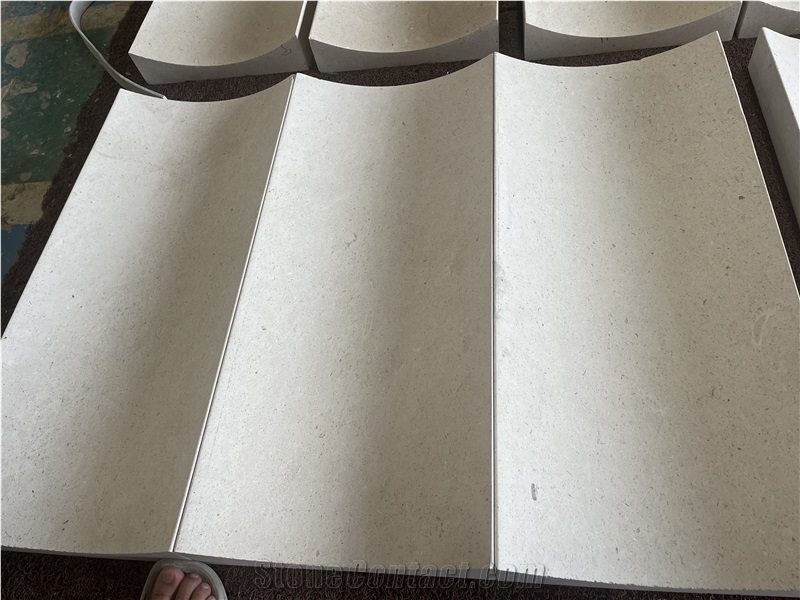 Carving Arched Limestone For Interior Wall Masonry