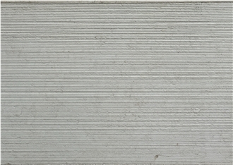 Corduroy / Rifel Vratza Limestone Combed Facade