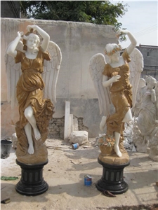 Yellow Marble Statues