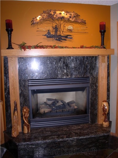 Cosmos Brown Granite Fireplace