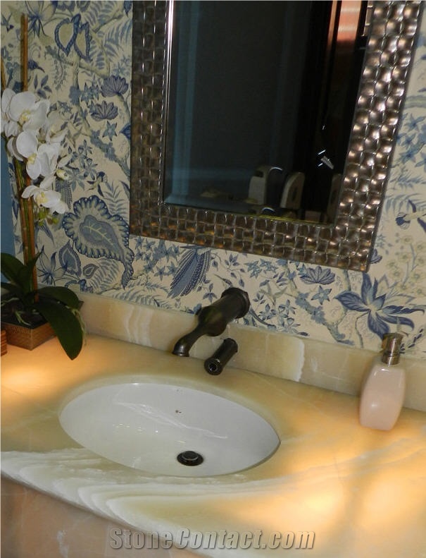 Baja Onyx Bathroomm Countertop and Ticul Naranja Limestone Flooring