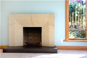 Hinuera Surround-Honed Absolute Black Hearth, Beige Limestone Fireplace