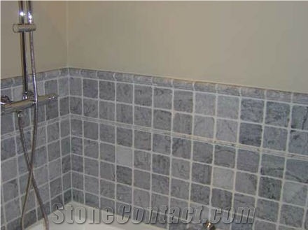 Tumbled Grey Marble Wall, Absolute Black Vanity to