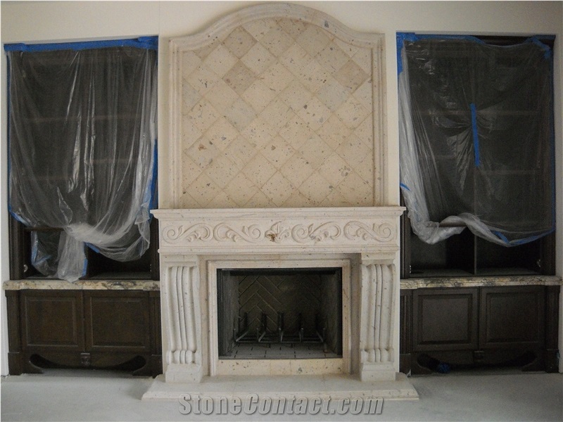 White Pinon Cantera Carved Fireplaces