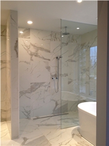 Calacatta Gold Marble Master Bathroom Design