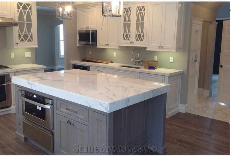 Kitchen Island Countertop Is Calcutta Marble With Eased Edge