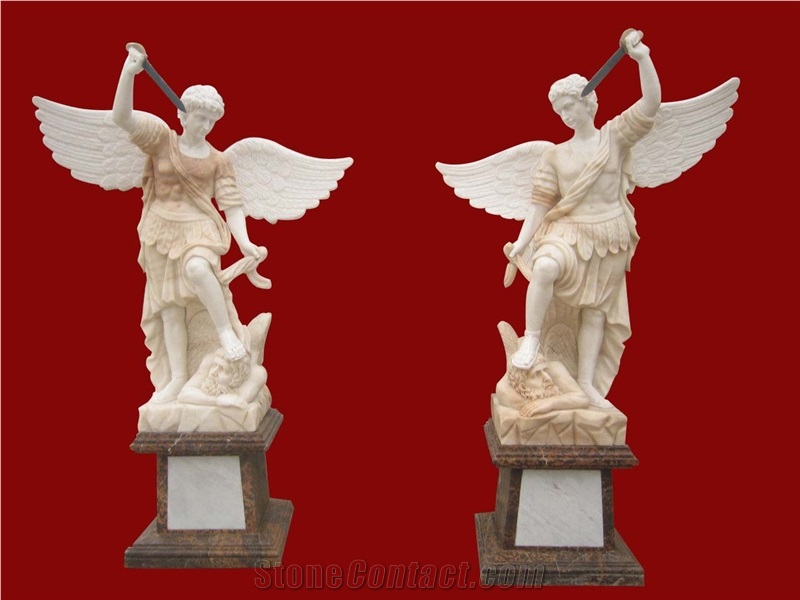a couple of angel statues,angel with wings sculptures,marble angel stone carving
