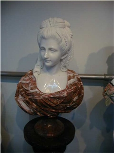 white and brown ,able statue,female head statue