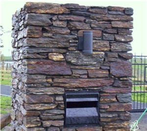 Alexandra Brown Schist Stone Outdoor Fireplace Design