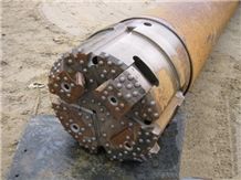 Overburden Concentric Casing Drilling System with Blocks