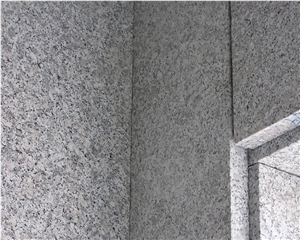 Rosa Beta Granite and Kanfanar Limestone Facade