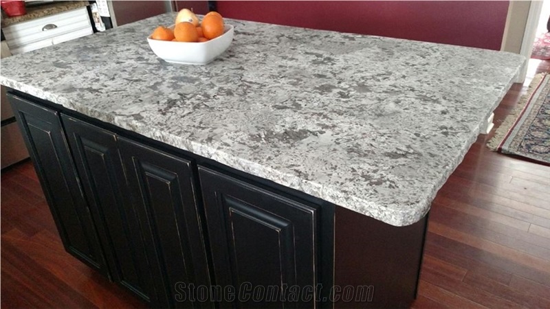 Island in Bianco Antico Granite Honed Finish with a Rock Edge Detail