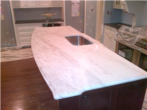Kitchen Island in Imperial Danby Honed Marble with an Ogee Edge Profile