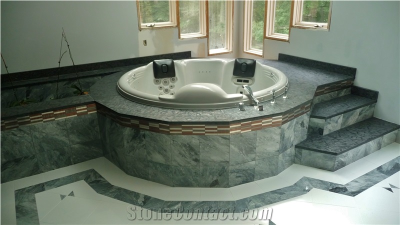 Grigio Perla Marble Tub with Meteorus Granite Deck and Steps