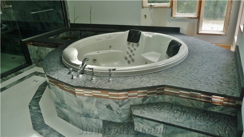 Grigio Perla Marble Tub with Meteorus Granite Deck and Steps