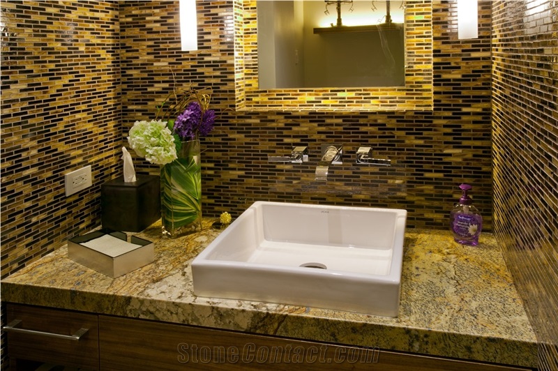 Exotic Granite Slabs Installed Throughout Bathroom Countertops