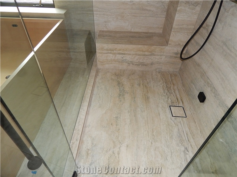 Ocean Blue Travertine Slabs Installed Throughout the Floors, Walls and Ceiling