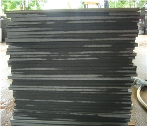 Xiamen China Nan Black Hole Basalt Slab Tile Cover Paver Flooring