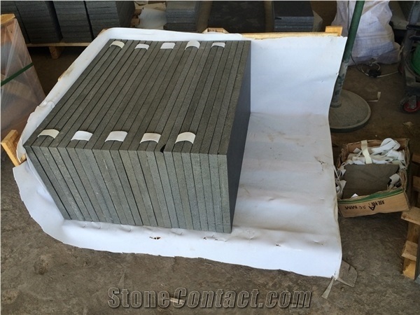 China Popular Cheap Hainan Absolute Black Basalt Andesite Honed Tiles for Floor and Wall, with Honeycomb, Natural Building Flooring Stone, Cladding Exterior Paving Decoration