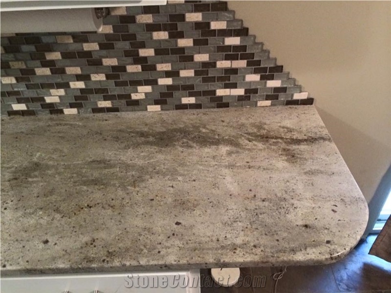 Backsplash, Granite Countertops and Slate Flooring