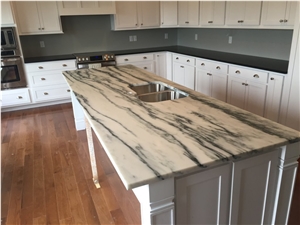 Mountain White Danby Marble HONED With Black Pearl Honed Countertops