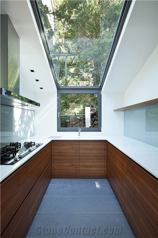 Kitchen with Corian Countertop, Orvieto Basalt Stone Flooring
