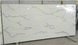 China Man-Made Quartz Stone Calacatta Marble Like Quartz Kitchen Countertop for Multifamily/Hospitality Projects Standard Slab Sizes 3000*1400mm and 3200*1600mm