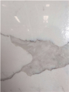 China Man-Made Quartz Stone Calacatta Marble Like Quartz Kitchen Countertop for Multifamily/Hospitality Projects Standard Slab Sizes 3000*1400mm and 3200*1600mm