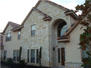 Stone Stucco Home with a Limestone Texas Mix and Grey Mortar