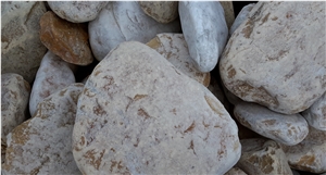 Giallo Siena pebbles