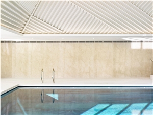 Beige Marble-Azul Macauba Quartzite Used in This State Of the Art Pool