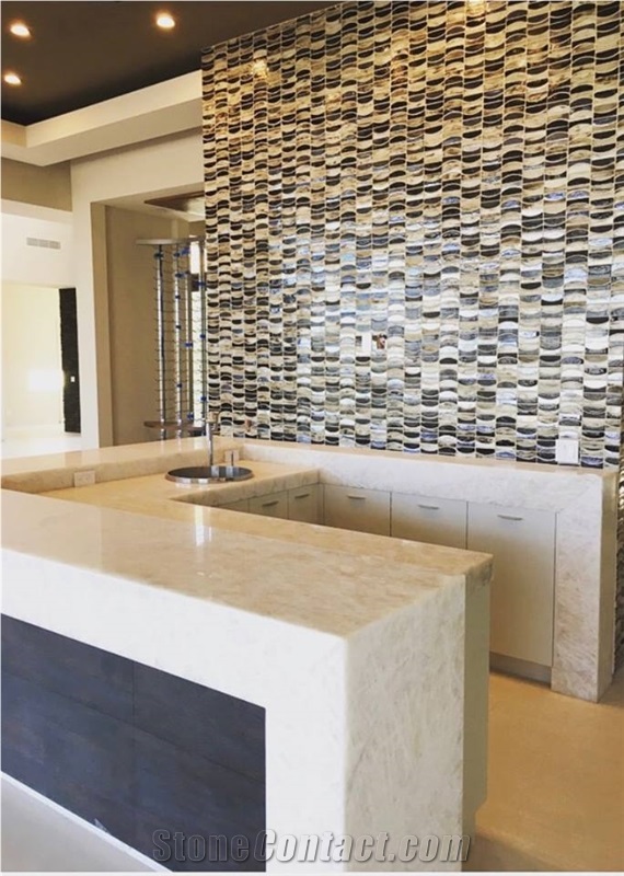 Quartzite Bianco Countertops Paired with The"Salsa Mosaic" by Dune