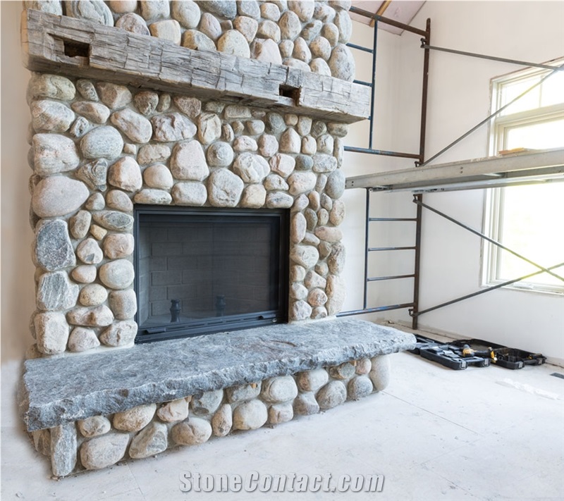 River Rock Muskoka Stone Fireplace and Oversized Flagstone Hearth