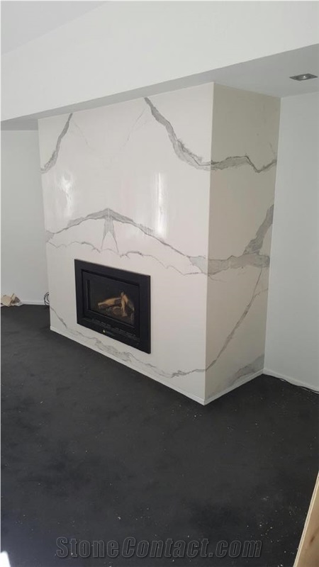 Statuario White Marble Look in Vein Link as the Feature Fireplace