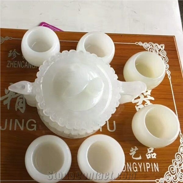 https://pic.stonecontact.com/picture201511/20174/16028/white-jade-tea-set-white-stone-tea-pot-jade-cups-p538222-1b.jpg