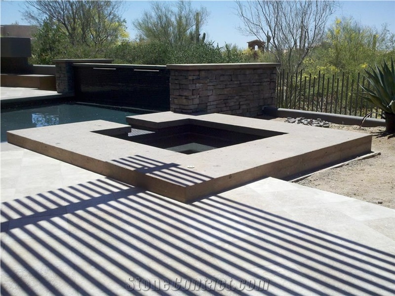Tobacco Brown Cantera Stone Pool/Spa Coping and Wall Caps.