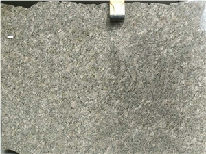 Brown Tusacany Granite Slabs