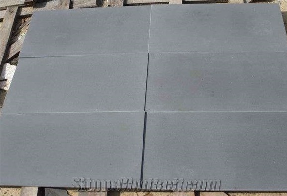 China Hainan Black Basalt Natural Stone Tiles&Slabs Sawn Cut Grind 200# Without Cut Marks Floor Covering Tiles ,Basalt Wall Coverying Tiles,Wall Stone,Building Stone,Paving Stones