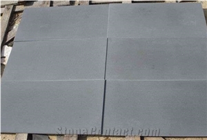 China Hainan Black Basalt Natural Stone Tiles&Slabs Sawn Cut Grind 200# Without Cut Marks Floor Covering Tiles ,Basalt Wall Coverying Tiles,Wall Stone,Building Stone,Paving Stones