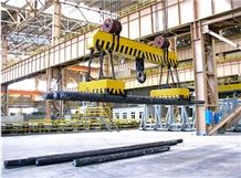 Slewing Telescopic Electromagnetic Overhead Crane with Carrier-Beam