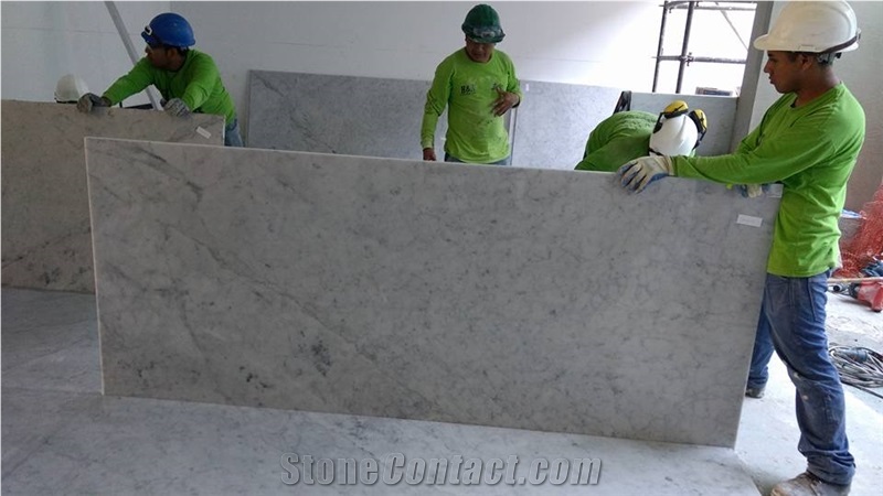 Installation Of Carrara White Marble Slabs for Floor